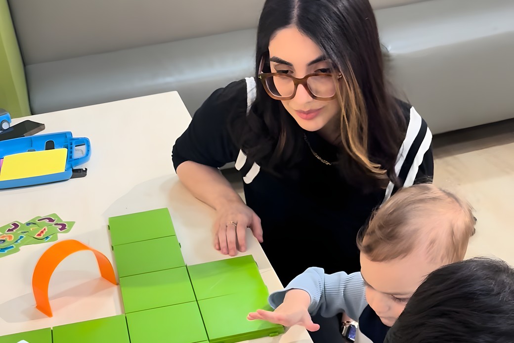 Negar teaching kids to code with robots and coding tiles at Boogles Coding Lab, Hillcrest, Richmond Hill